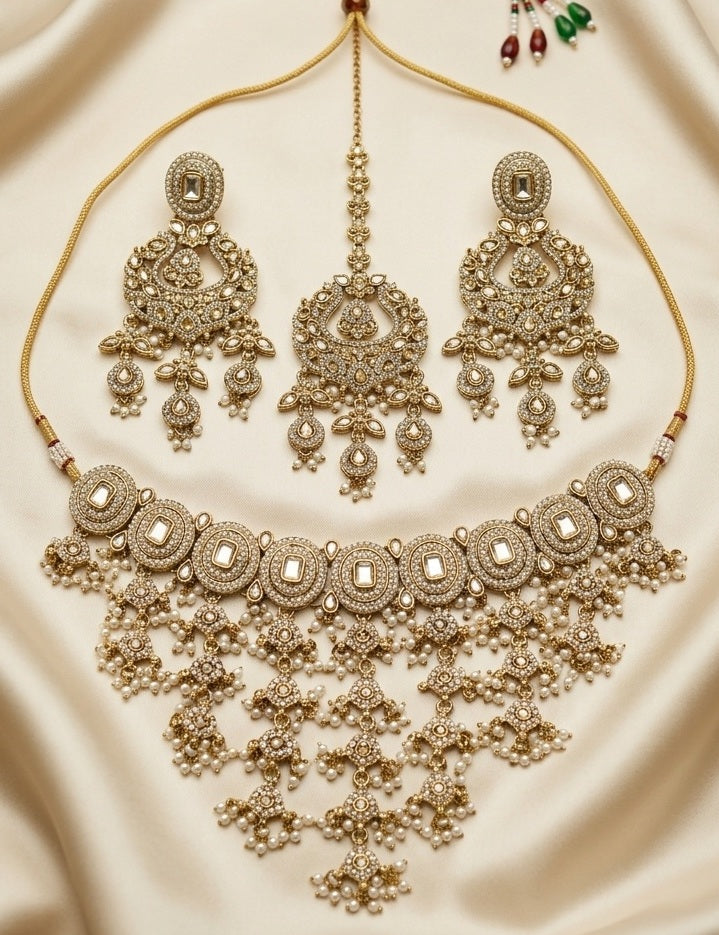 Ira Kundan and Pearl detailing-Waterfall Bridal Choker Necklace Set with Earrings & Maang Tika- Gold